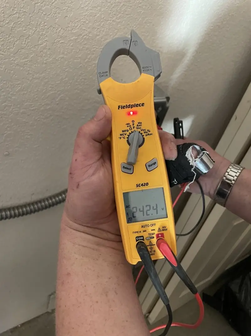 Voltage testing with clamp meter during Generator Installation in Frederickson
